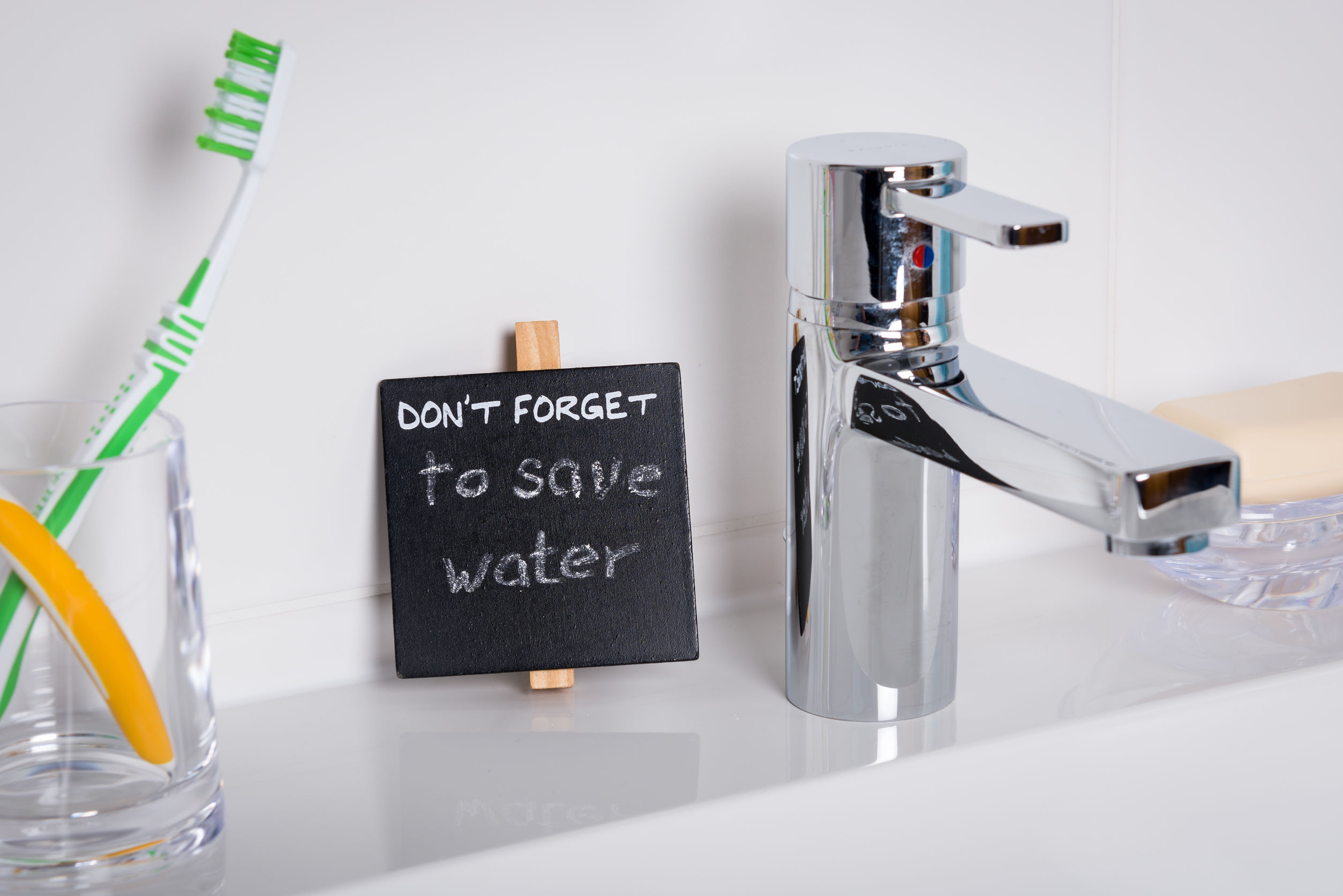While tap. Save water bathroom. save water turn off tap while brushing. turn off the tap.