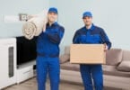 moving men with box and carpet