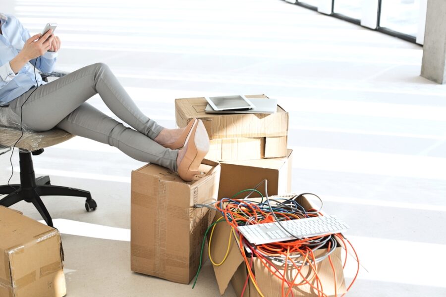 woman on phone box of it equipment