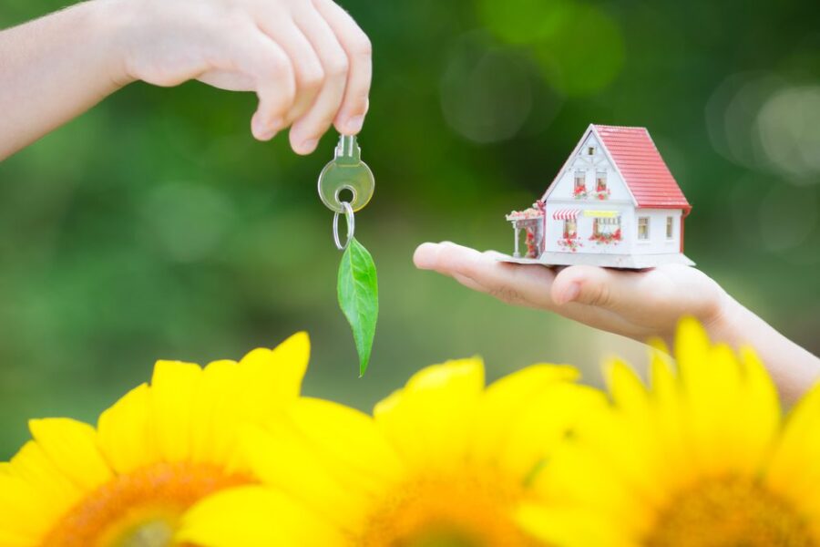 spring flowers with new house and keys